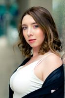 Brunette woman model portrait in white shirt