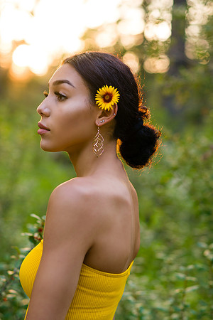 teen woman model side portrait during golden hour